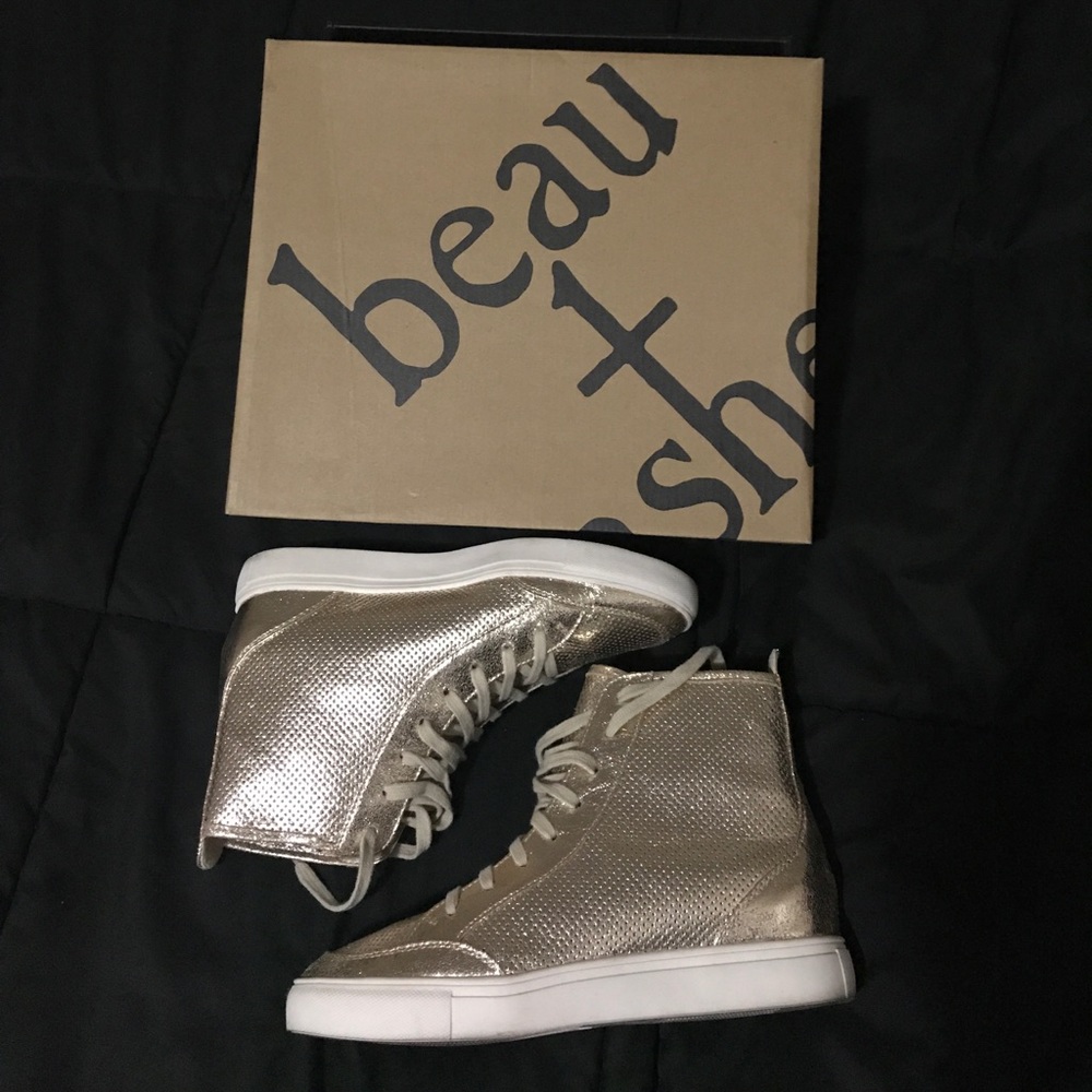 Gold and white high top sneakers