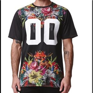 On the Byas fancy football jersey. Size Large