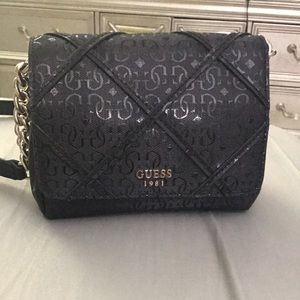 Guess cross body purse Black.