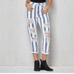 Blue and white striped distressed jeans