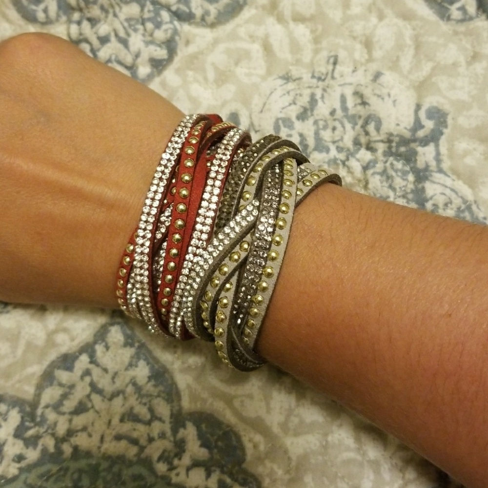 Two Immatation leather braceletts