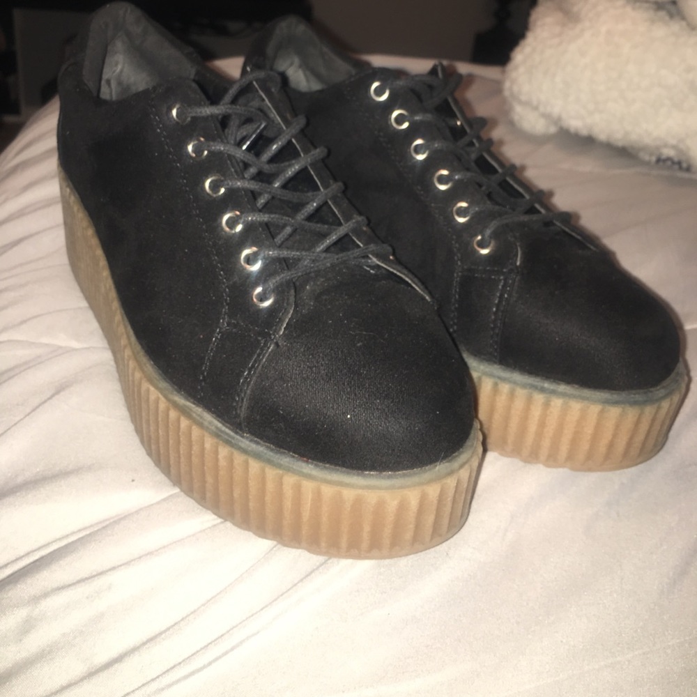 Black platform sneakers