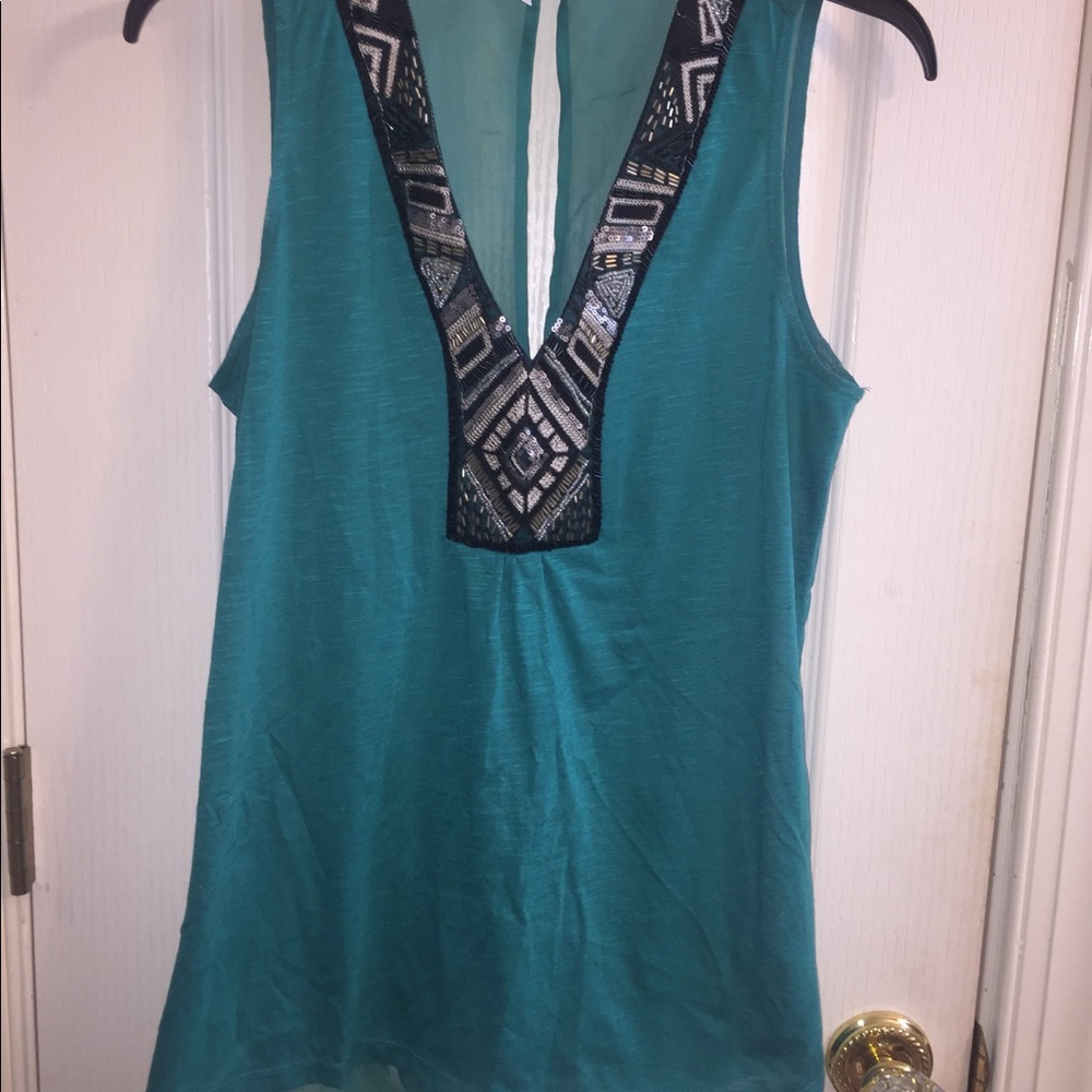 Adorable top. 2 items for $10.