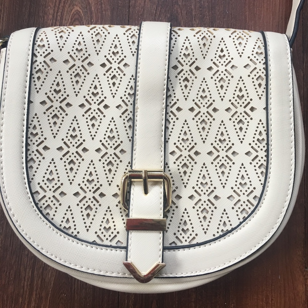 Cream Cutouts Purse.