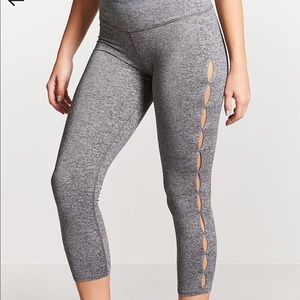 Brand new leggings with cute side cutouts!