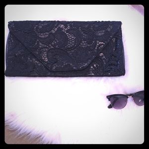 JS black lace clutch