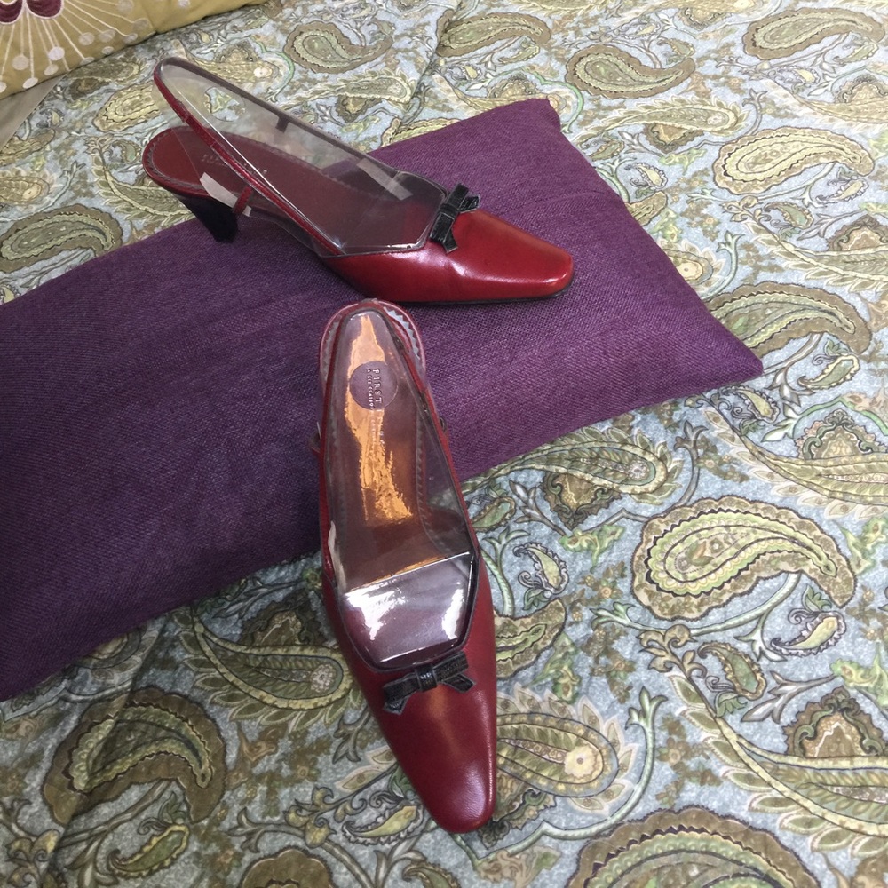 Sling back red shoe black bow