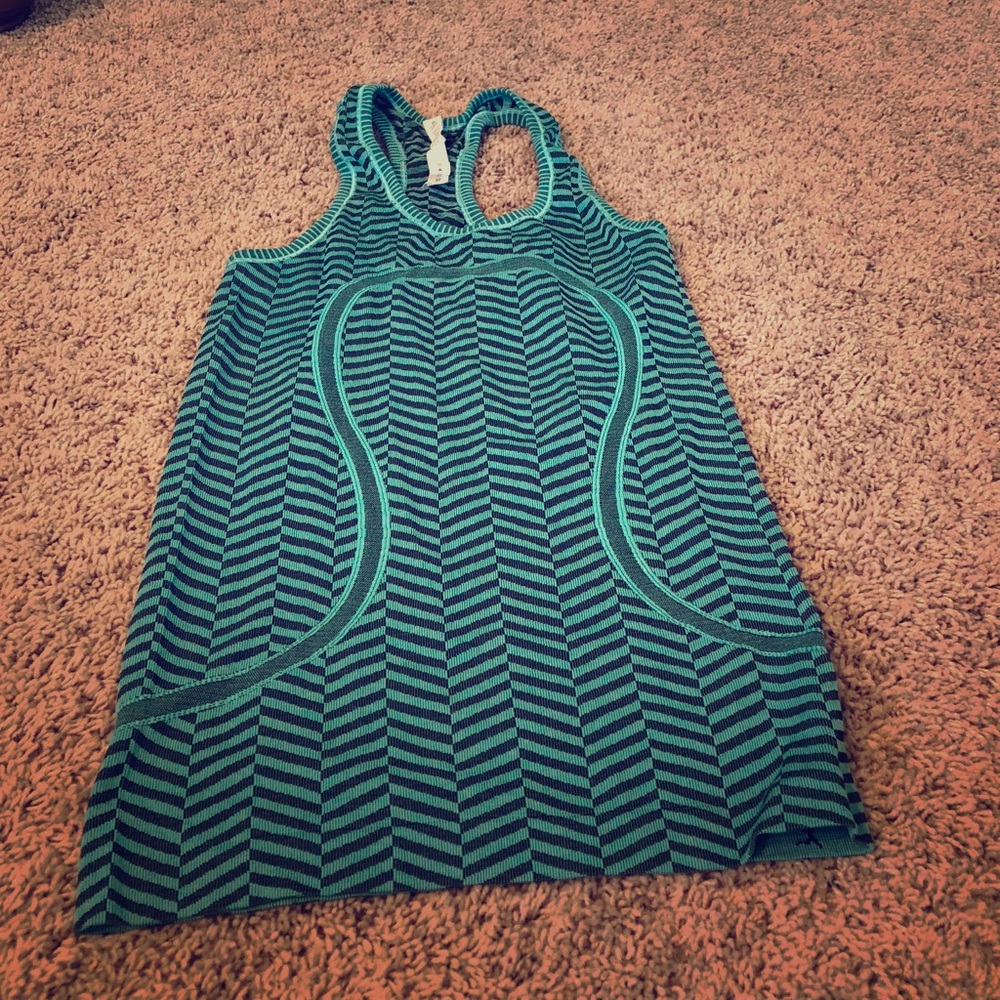 Lulu racer back tank top on teal and black.