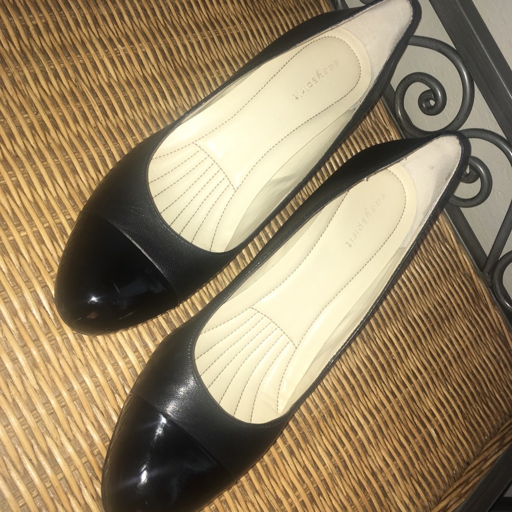 Black leather pumps