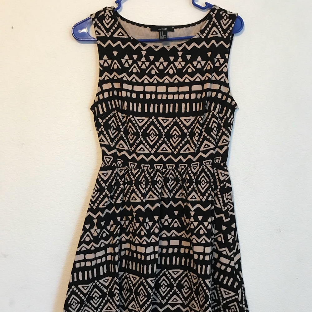 Tan and black sleeveless dress