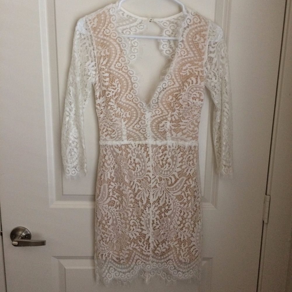 Deep V neck three quarter sleeve white lace dress