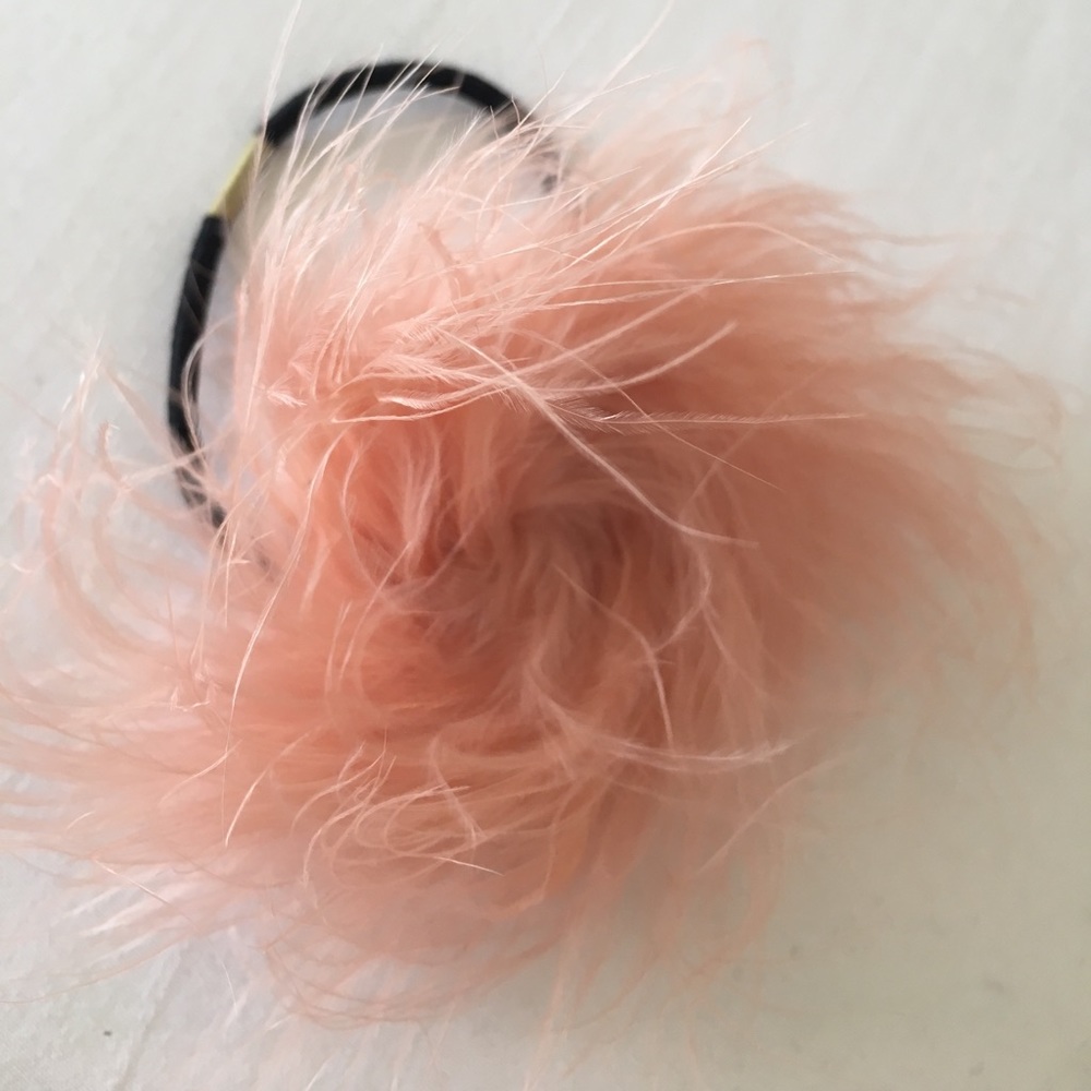 Fluffy pink hair tie. 90s