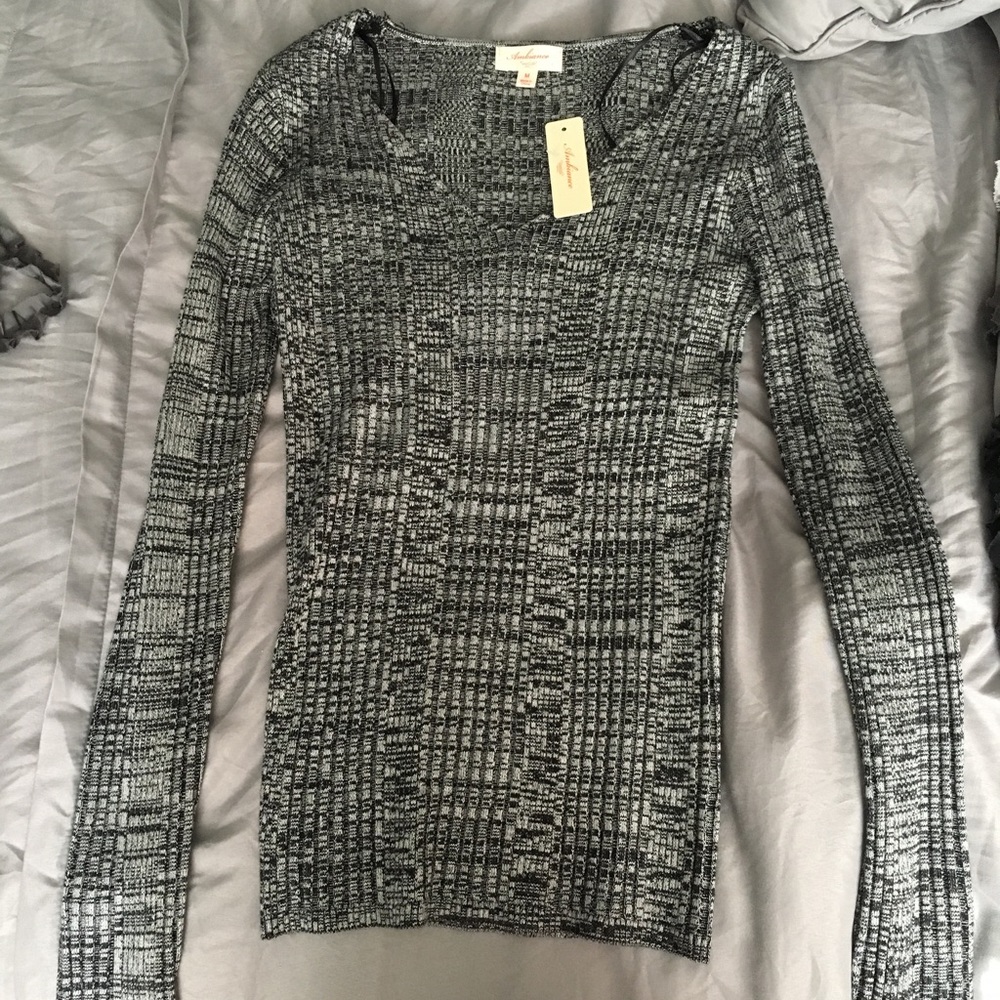 Brand new black and white sweater