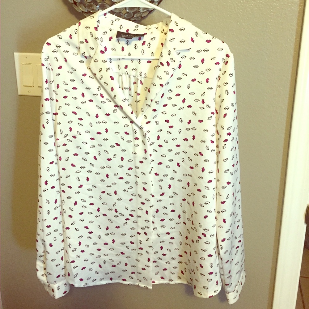 Off white colored blouse.