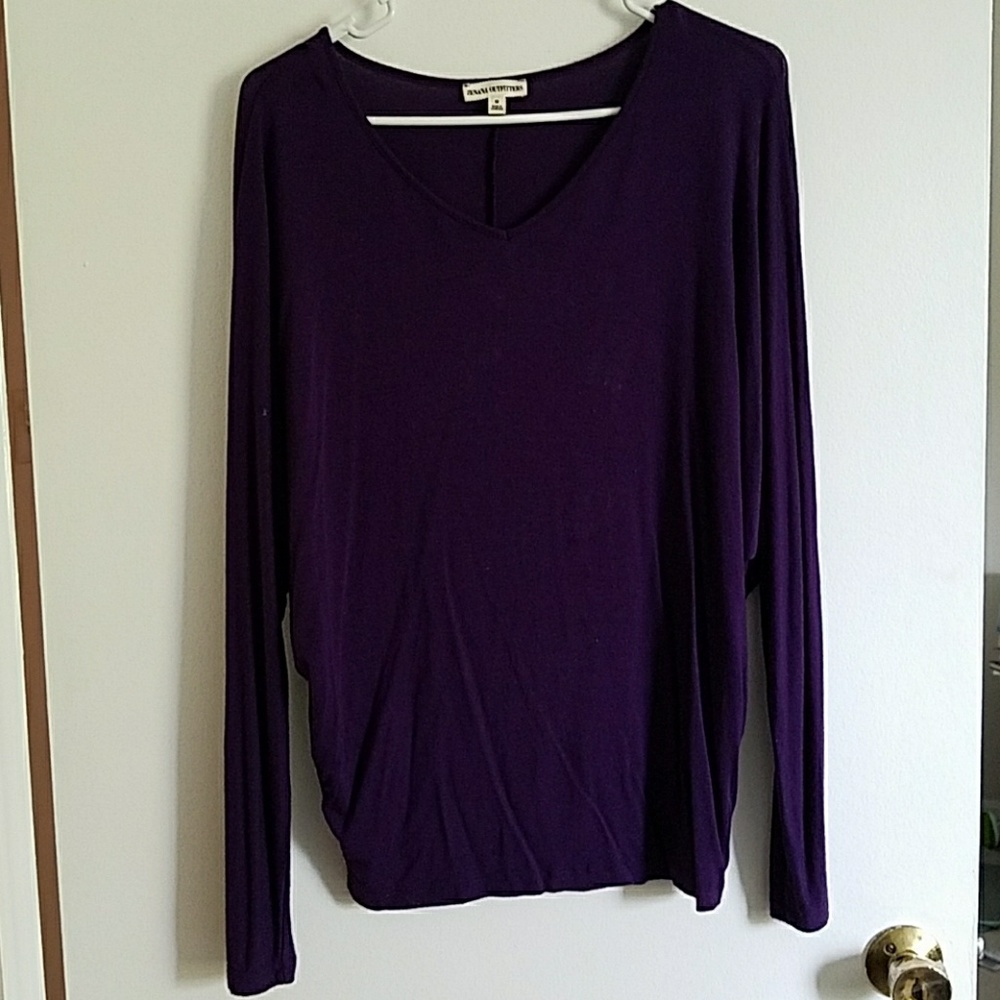 Dark purple blouse with draped sleeves
