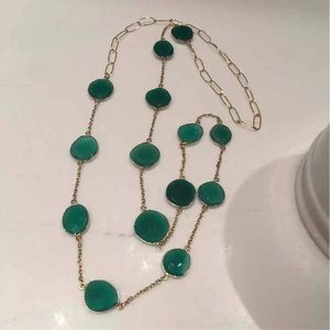 Green stones necklace.
