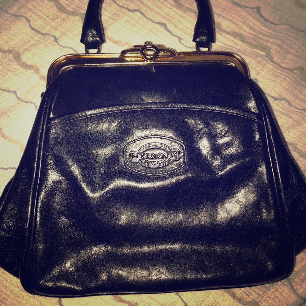 Oroton LIKE NEW black leather. No extra strap.