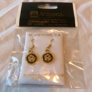 Gold/black floral earrings from Spain