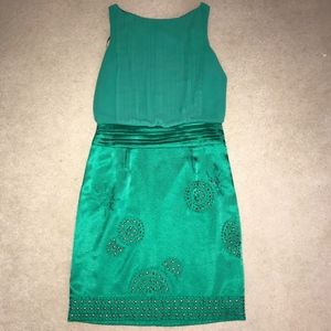 Vince Camuto green dress with metal embellishments