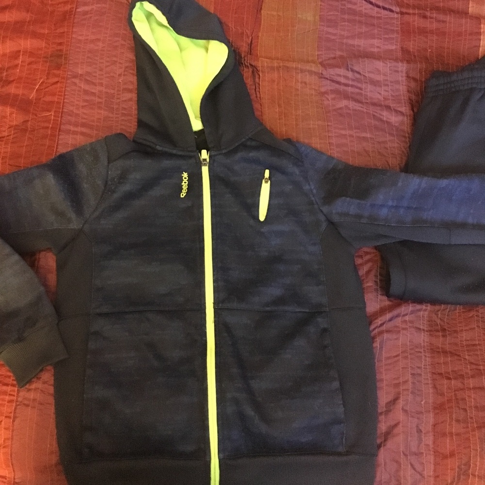 Reebok sweat suit.