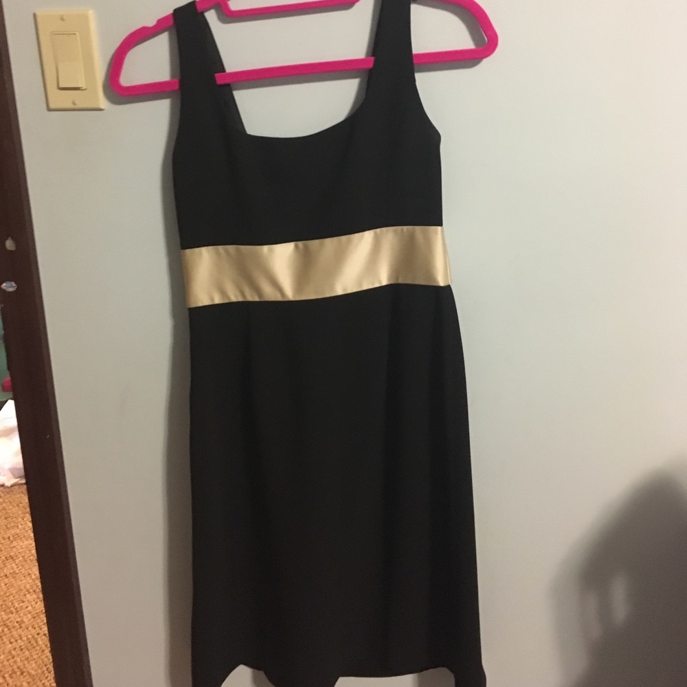 Black cocktail dress with gold accent