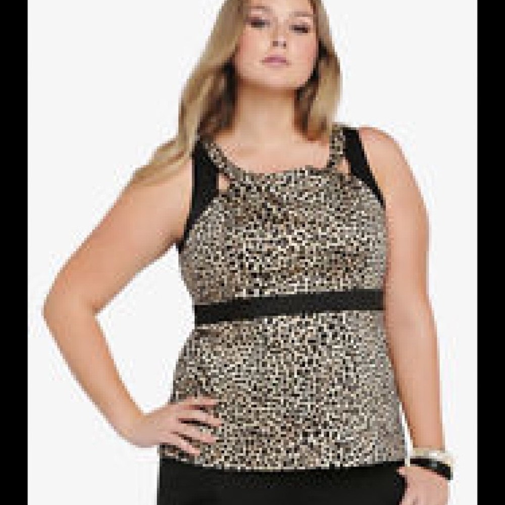 Torrid sateen peplum animal print top size 5