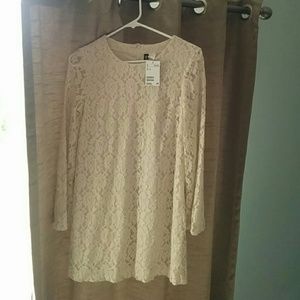 Ivory lace mini dress from H&M with bell sleeves.