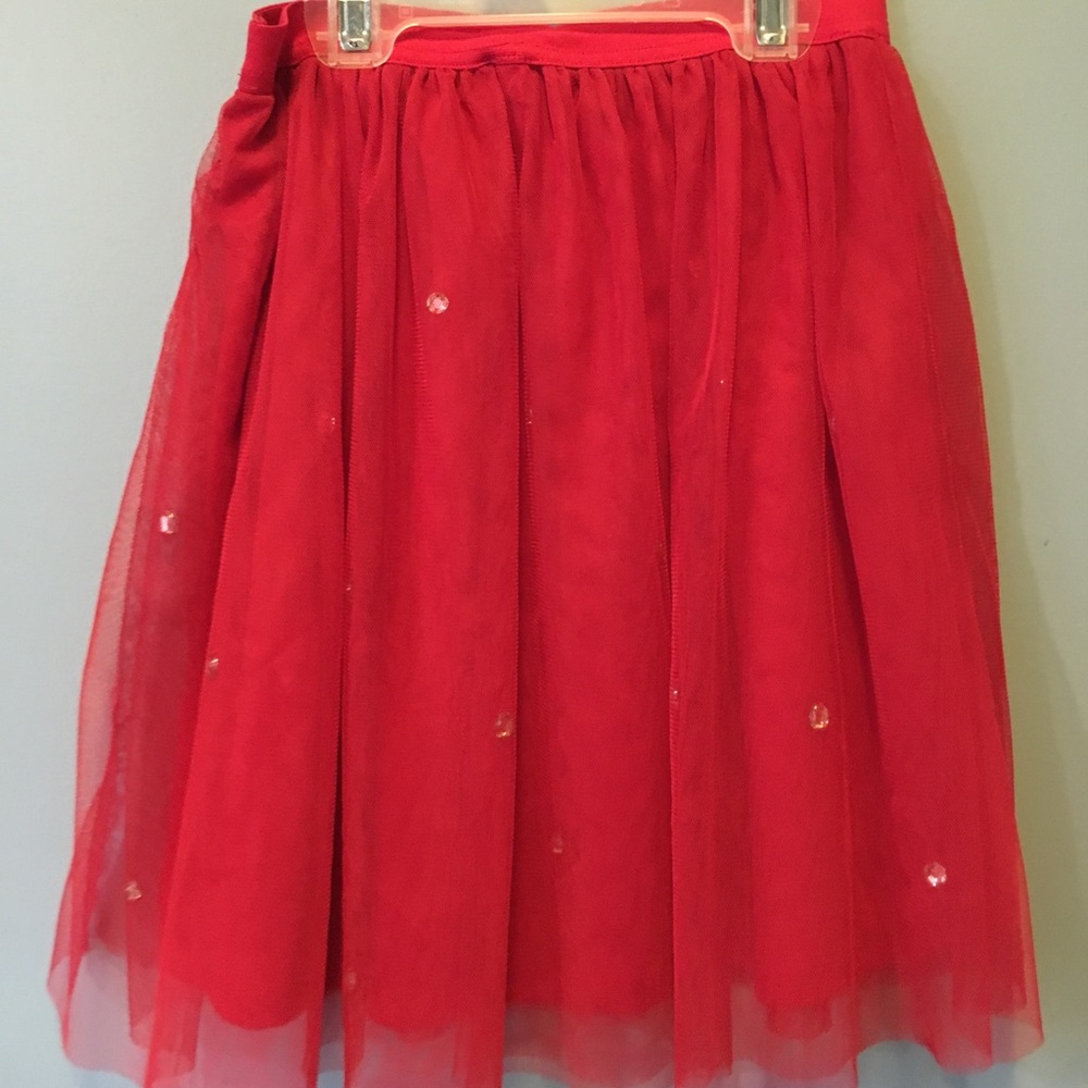 Red skirt with tulle overlay and rhinestones