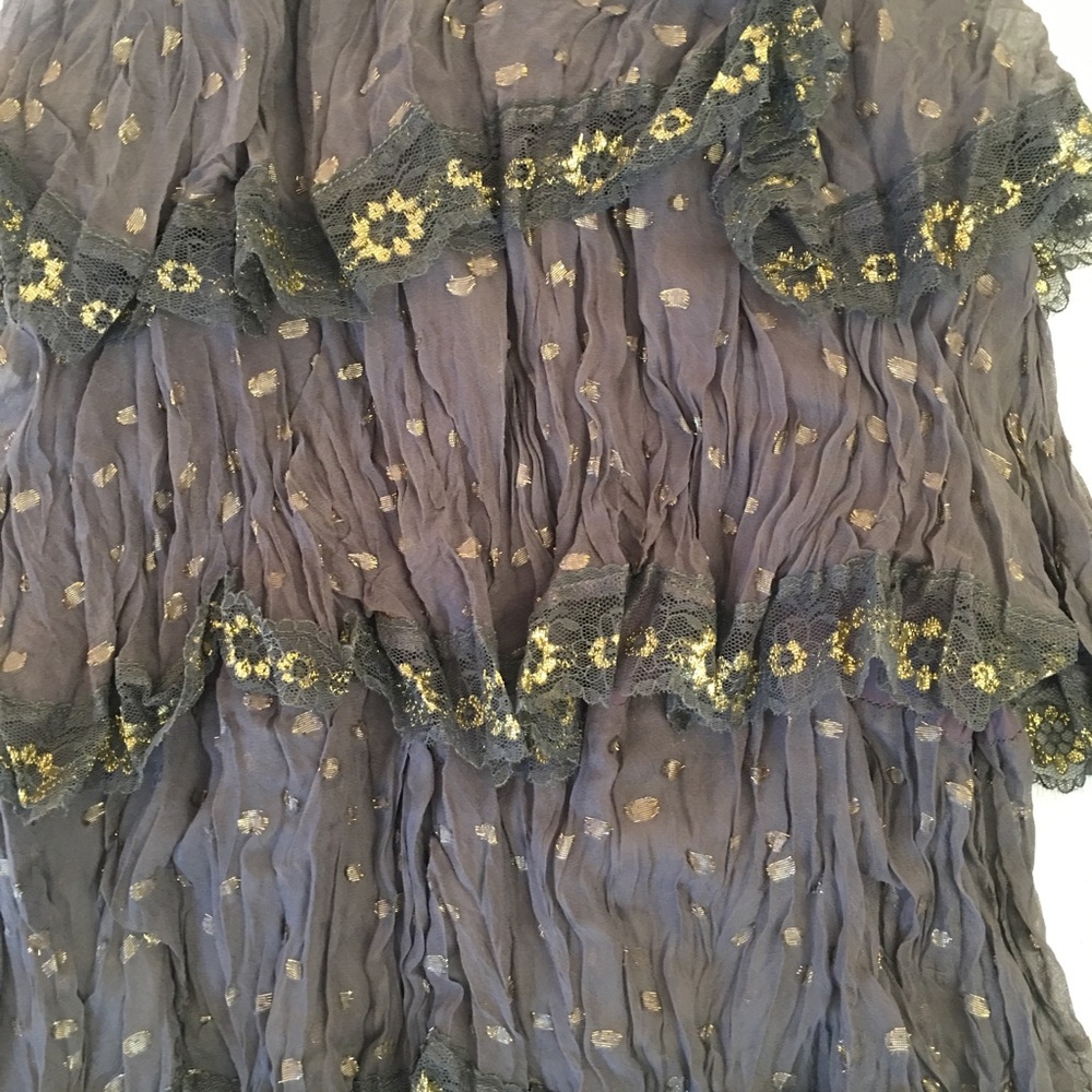 Sleeveless gunmetal top with gold detail