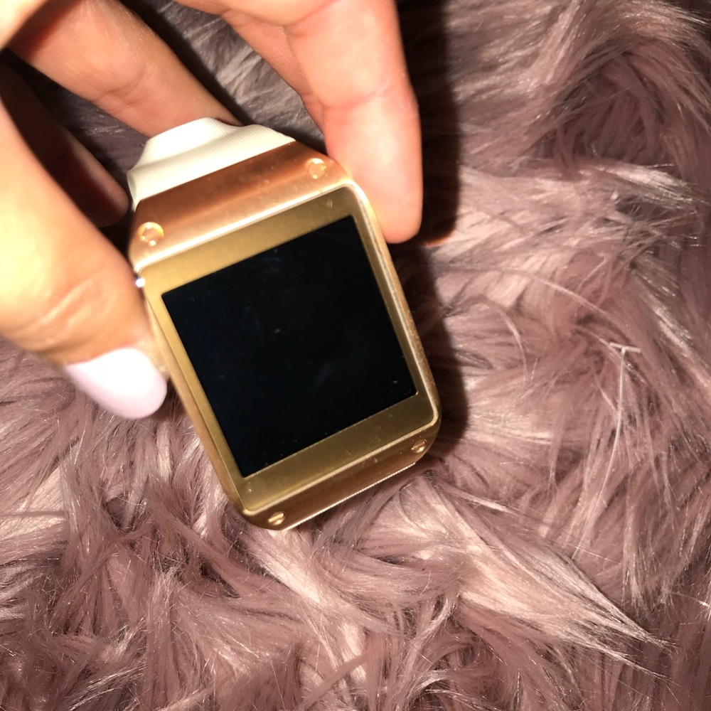 White & gold Samsung Galaxy Watch