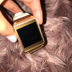 White & gold Samsung Galaxy Watch