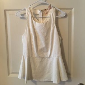 Classic and flirty top with cutout back pattern!