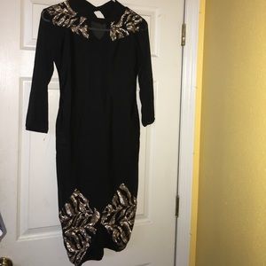 Angel Brinks sequins black dress.
