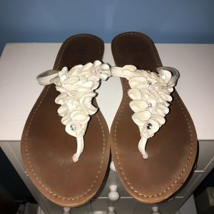 Comfortable, white ruffled sandals.