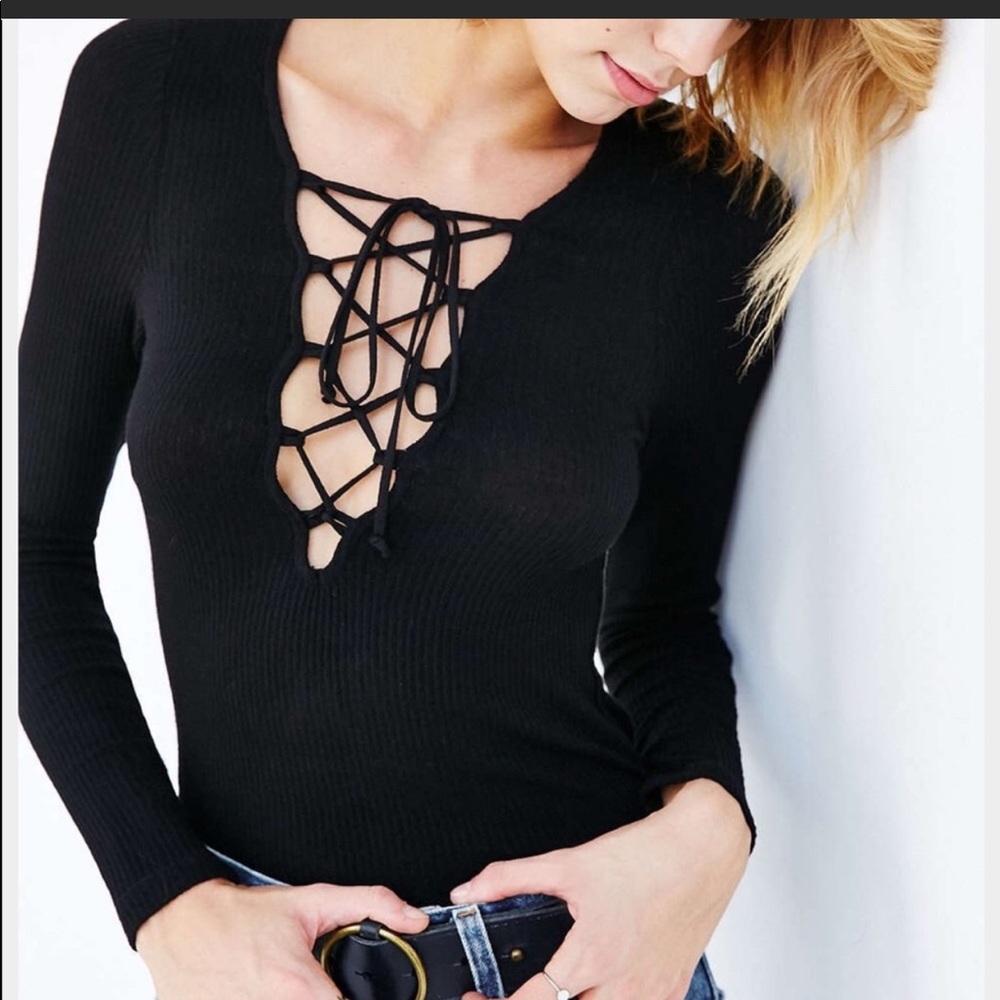 Both gray and black top. Medium