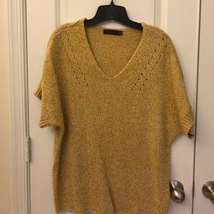 The limited yellow short sleeve sweater