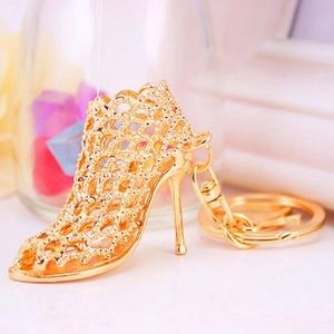 Gold high heel key chain