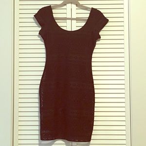 Black mini dress with tribal stitching detail