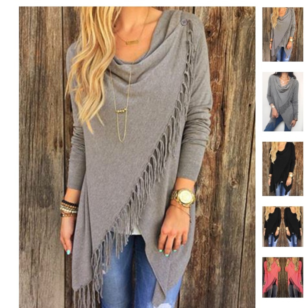 Asymmetrical gray sweater. Size medium