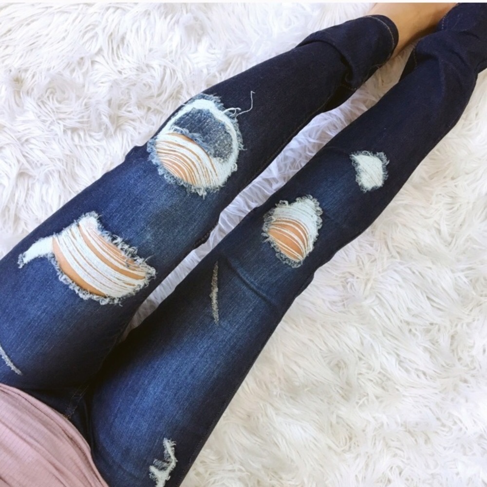 Destroyed dark skinny jeans