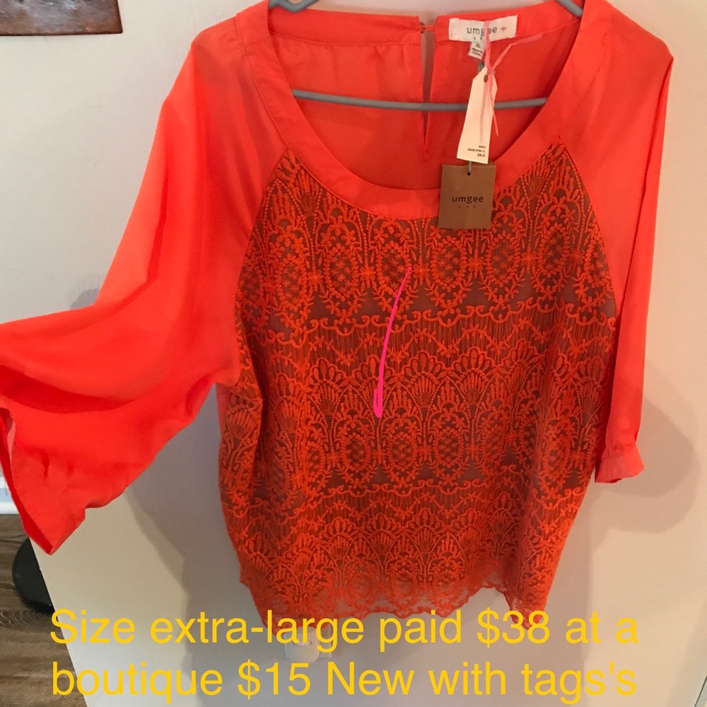 Orange boutique shirt never worn new with tags