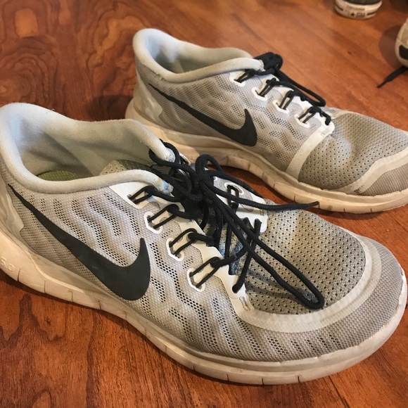 Grey Nike shoes, worn but still in good shape - Picture 1 of 3