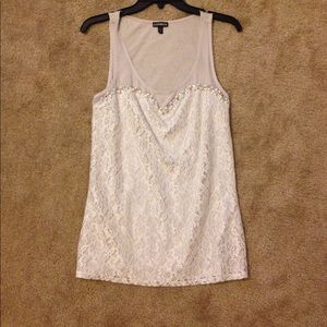 Sleeveless top beaded with lace and rhinestones