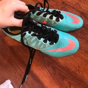 Blue and pink track shoes