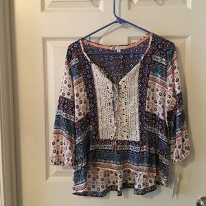 Never worn and with original tags floral blouse!