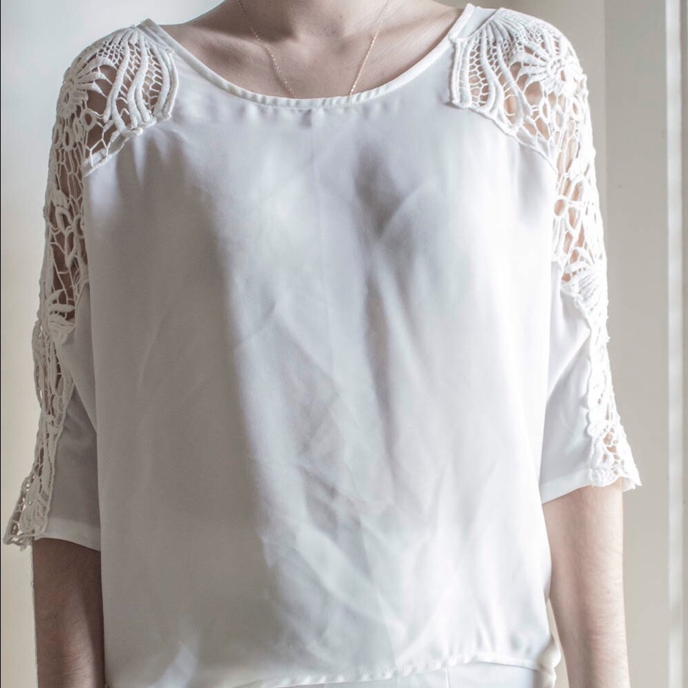 White blouse with patterned sleeve