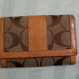 Signature Coach Wallet.