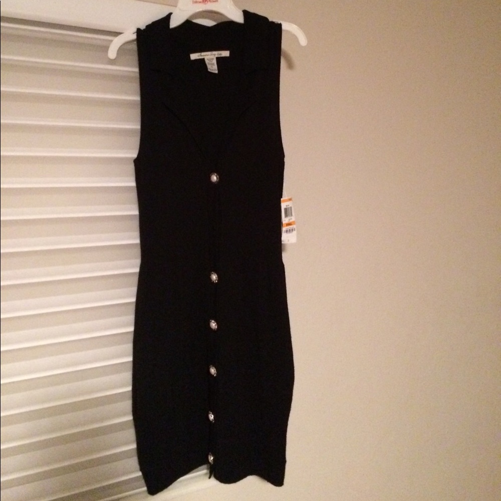 Black knit dress with pearl/silver buttons