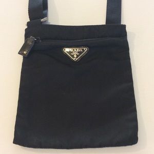 Prada cross body messenger bag.