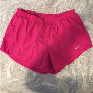 Hot pink Nike running shorts, size Medium